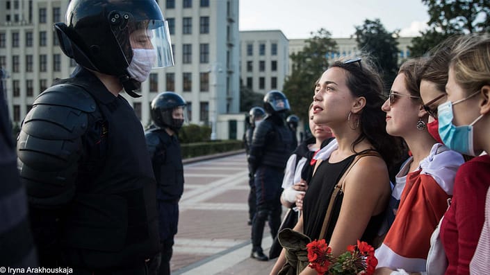 7. Young women string at policemen-conpyright Iryna Arakhouskaya